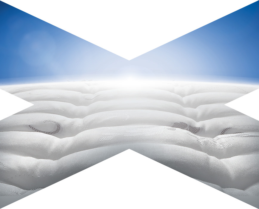 A mattress framed by an X