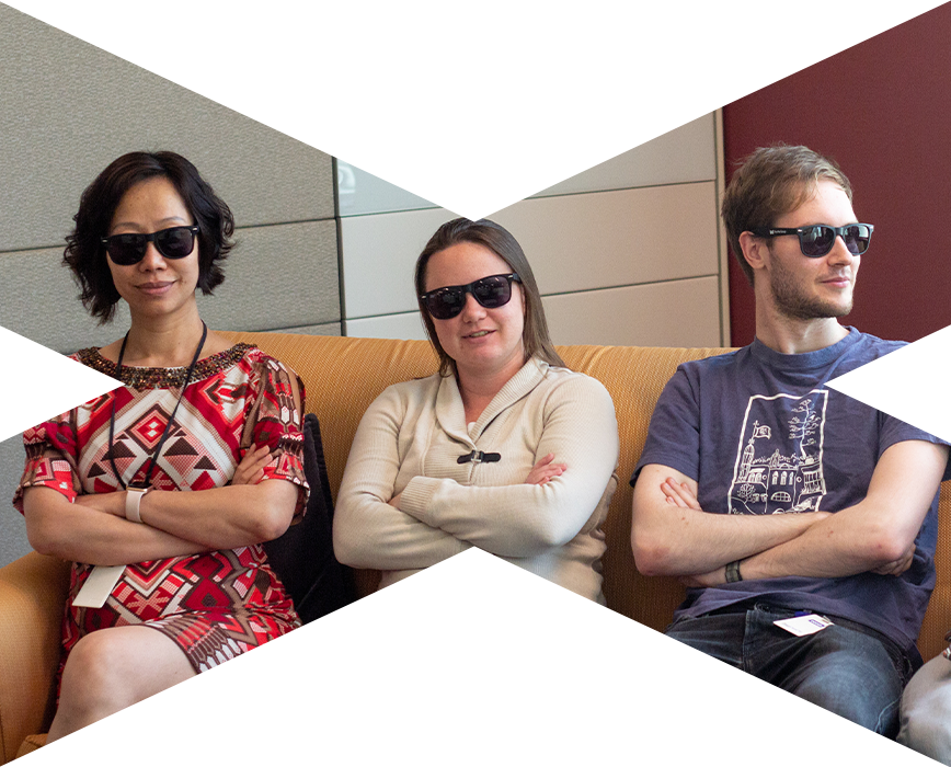 group of three mx employees sitting on couch with sunglasses