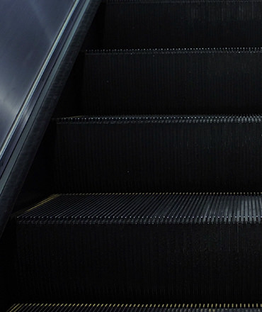 Dark close up of escalator steps