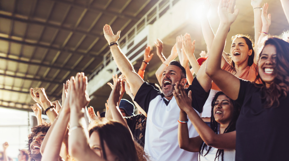 crowd cheering at an event