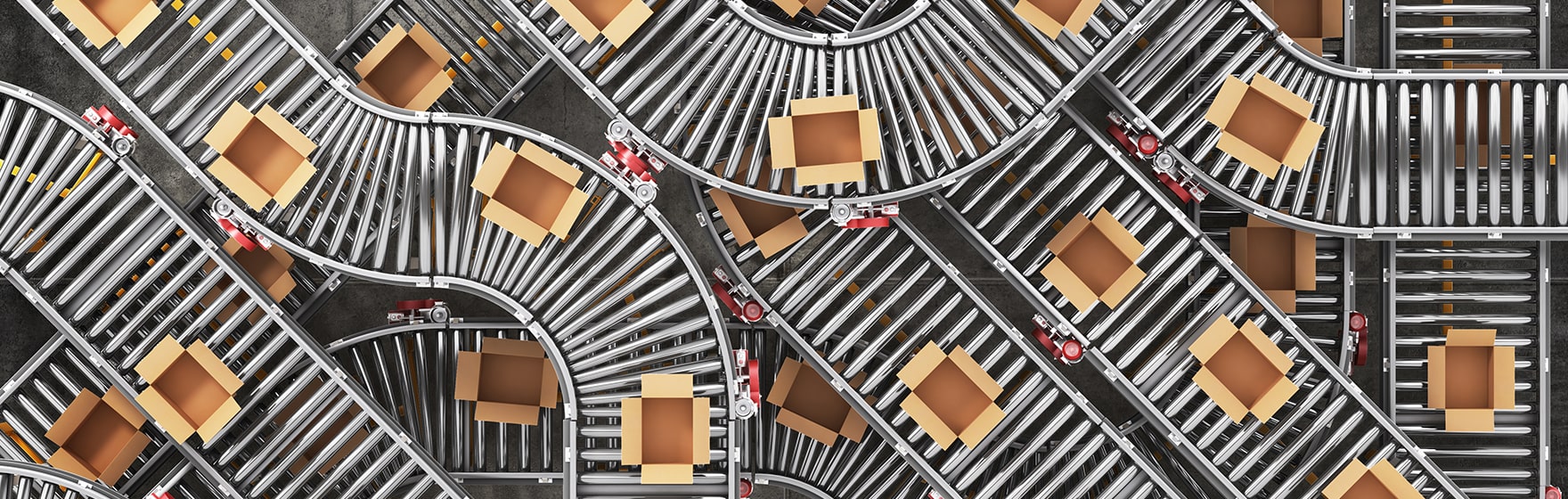 Conveyors with cardboard boxes moving down a conveyor belt