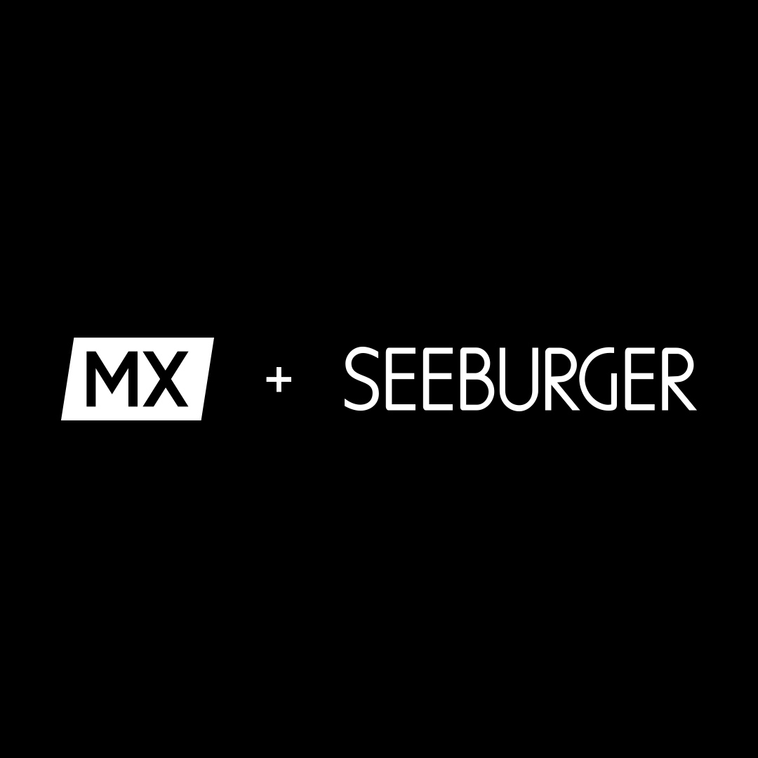 The MX Group logo plus SEEBURGER logo